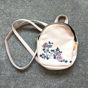 Ardene faux leather floral embroidered pink backpack